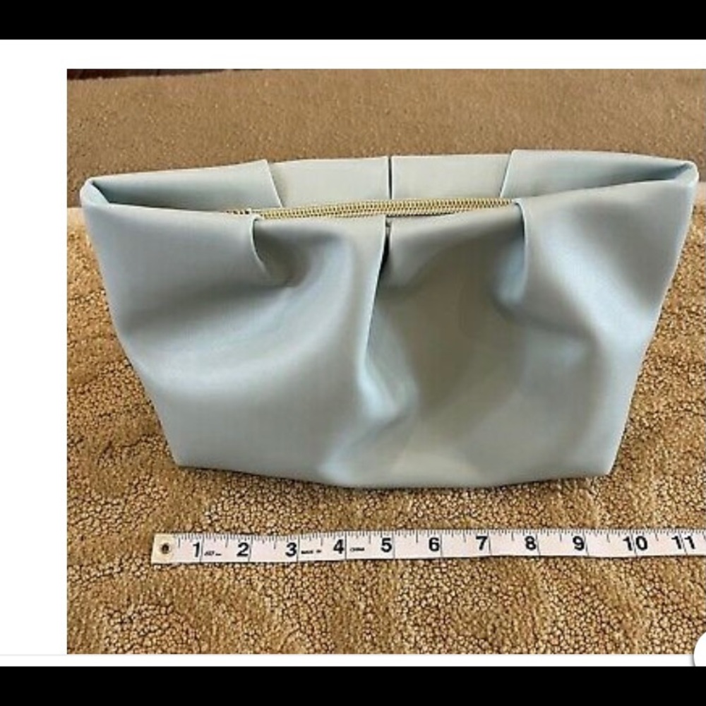 Clutch bag looks like Bottega but is Cos Bar